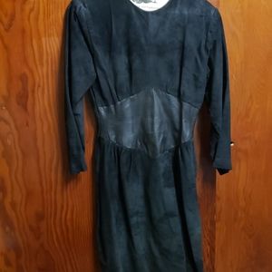 SADE AND leather dress¹